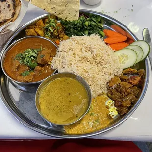 Nepalese goat, lentil soup, spinach, etc.