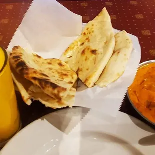 Mango lassi, plain naan, butter chicken (spice level 5).