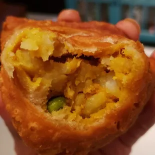 Interior of veg samosa ($6). Nicely done. Excellent shell texture.