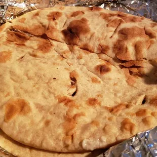 Roti ($3.45). Vegan by default. Way too thick and doughy. Poorly made.