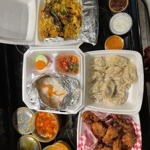 Top left: Aloo Gobi Curry, CHICKEN BIRYANI Bottom left: chicken wings, Chicken Momo