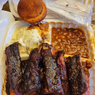 Pork Ribs Dinner, with potato salad and beans, cornbread muffin