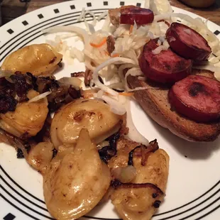 Fresh bread, kielbasa and sauerkraut from the store and some fried up pierogis that we bought there too!