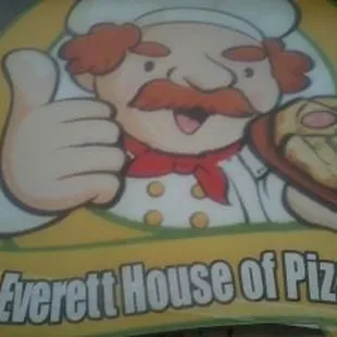 a man holding a pizza