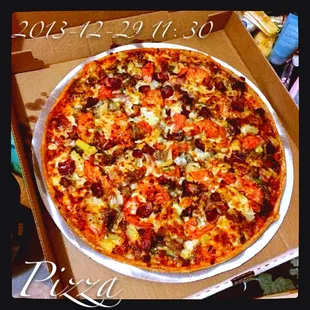 a pizza in a pizza box