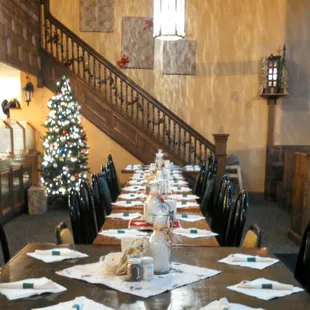 a long table set for a holiday party