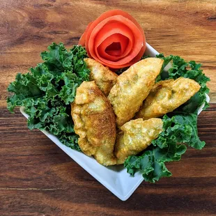 a plate of fried food on a table