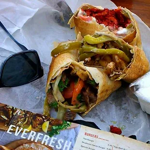 Filled belly with Love  Beef n Chicken Shawarma n Sojuk me addiction, tub of Toum 3 sandwich only 10 bucks Love