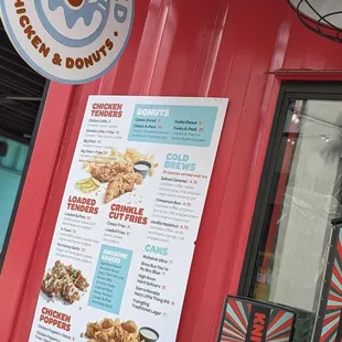 a menu on a red wall