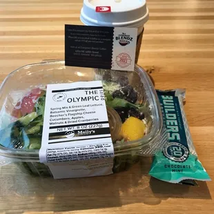 Peppermint mocha, BUILDERS protein bar, and The Olympic salad