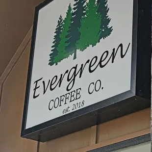 sign for evergreen coffee company