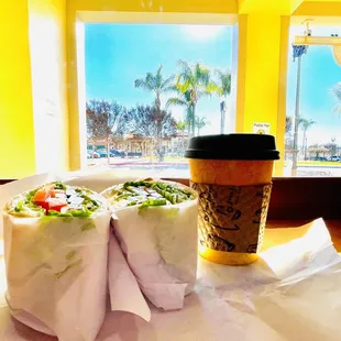 a burrito and a cup of coffee