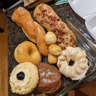 a variety of doughnuts on a table