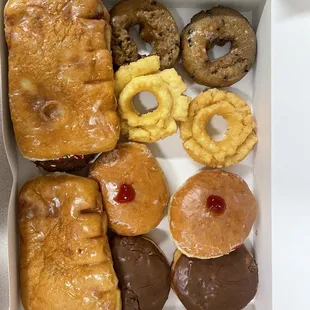 a variety of doughnuts in a box