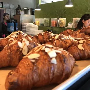 a tray of croissants on a counter