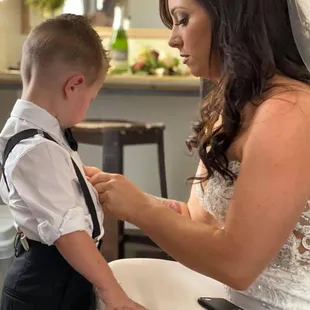 Bride and ring bearer getting ready to walk down the isle!