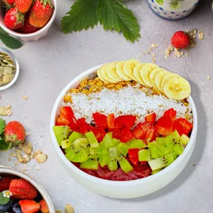 a bowl of fruit and nuts