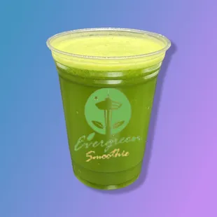 a green smoothie in a plastic cup