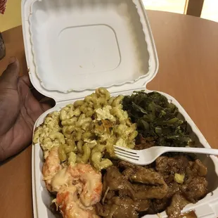 Mac and cheese, greens, jerk chicken and shrimp