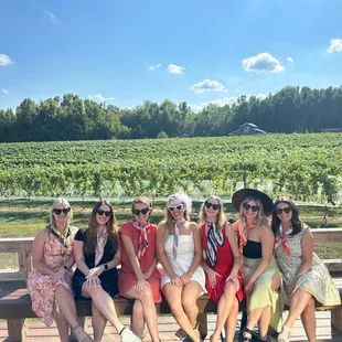 Bachelorette group on the patio overlooking the vineyard.