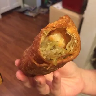 a person holding a pastry