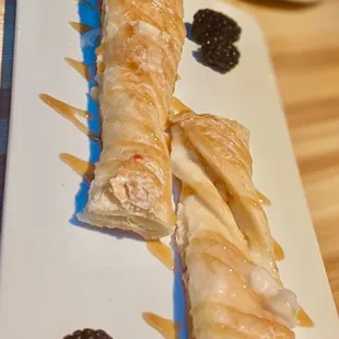 Kiedrowski's world-famous Snoogle topped with our house Bourbon Caramel drizzle and fresh fruit