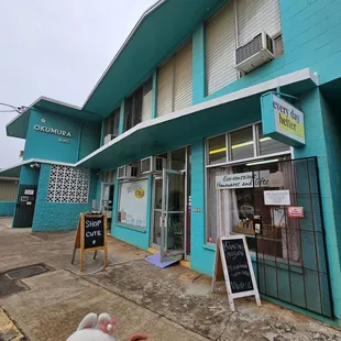Storefront... bottom right corner of the building