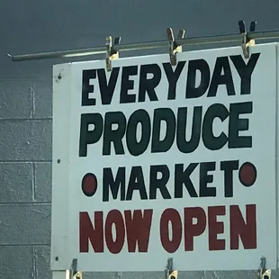 a sign hanging on a wall