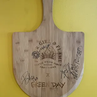 Green Day autographed pizza paddle.