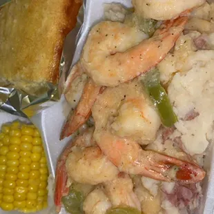 Garlic butter shrimp w/ honey butter cornbread and corn