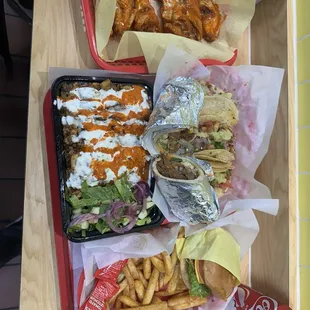 Beef burger Combo over rice chicken wings Beef taco Fries