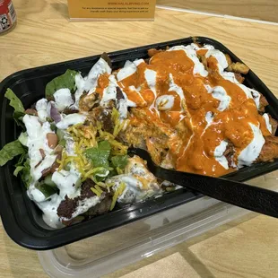 Lamb and chicken over rice