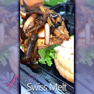 a sandwich with mushrooms and lettuce