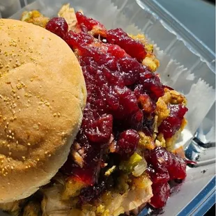 a sandwich with cranberry sauce