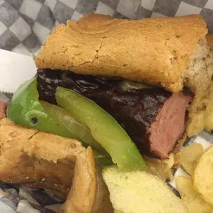 Polish Turkey Sausage with peppers and onion on wheat bun! Delicious!