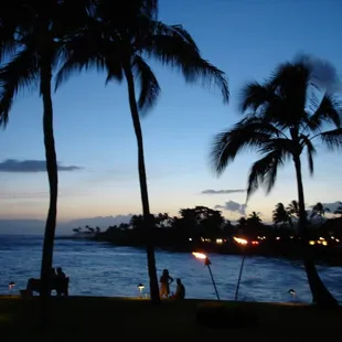 Kauai sunset.  Evie organized this trip so we could attend a friend's wedding.