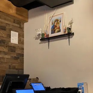 This is very different. Most PHO have a shrine dedicated to Buddha or some other god. This one is Christian. Dedicated to Jesus and Mary!