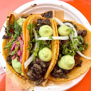 Pastor and octopus tacos