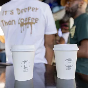 two cups of coffee on a table