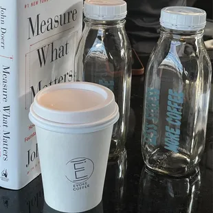 a cup of coffee and a book