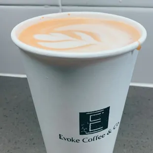 a cup of coffee on a counter