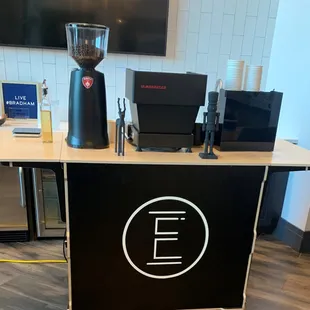 a coffee grinder on a table