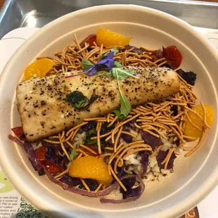 Mahi mahi fish bowl , orange, crispy rice noodles, brown rice &amp; quinoa blend,  kale &amp; veggies