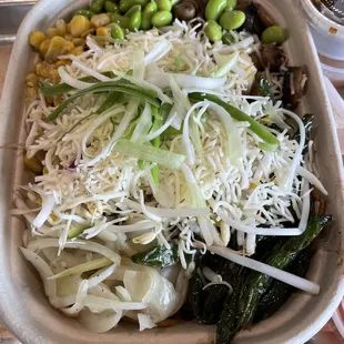 Tofu bowl loaded with warm and cold veggies, complete with yum yum and garlic sauces. Everything is made from scratch!!