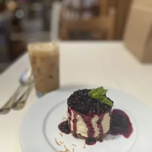 Cheese cake with a berry compote and a Greek coffee.