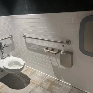 No toilet paper in the disabled stall.