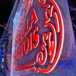 a neon sign for a restaurant