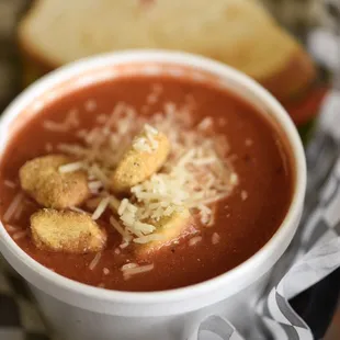 a bowl of soup with croutons