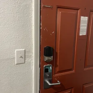 Door with a hole from previous handle and no chain lock.