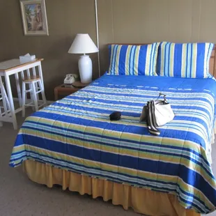 Queen bed in an efficiency condo